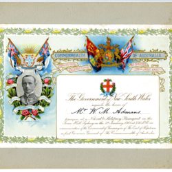 A landscape invitation. THere is a portrait of a man in gey to the left surrounded by coloured depciticons of australian landscape. There are flags above his head.