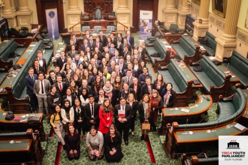 A group of young people standing in the House of Assembly in South Australian parliament.